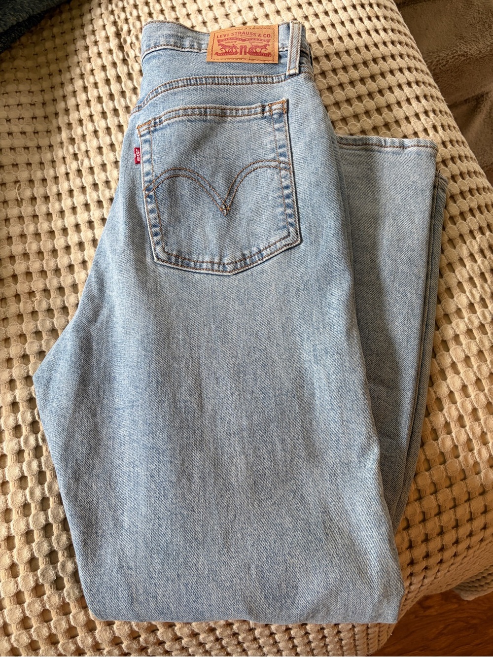 Levi's Light Blue Denim Jeans with Copper Stitching and Interior Tags